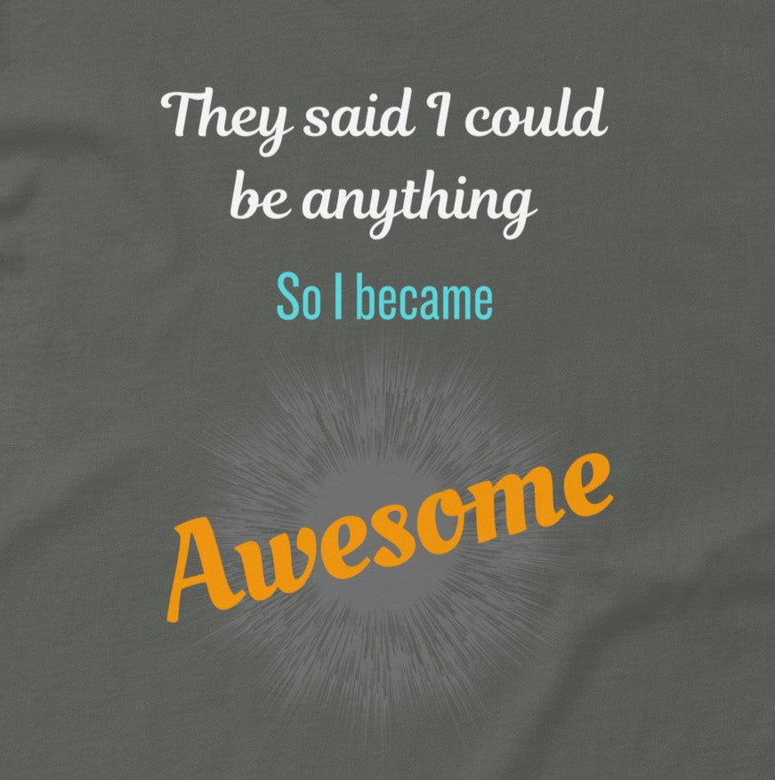 Close-up funny motivational quote So I Became Awesome on charcoal tee